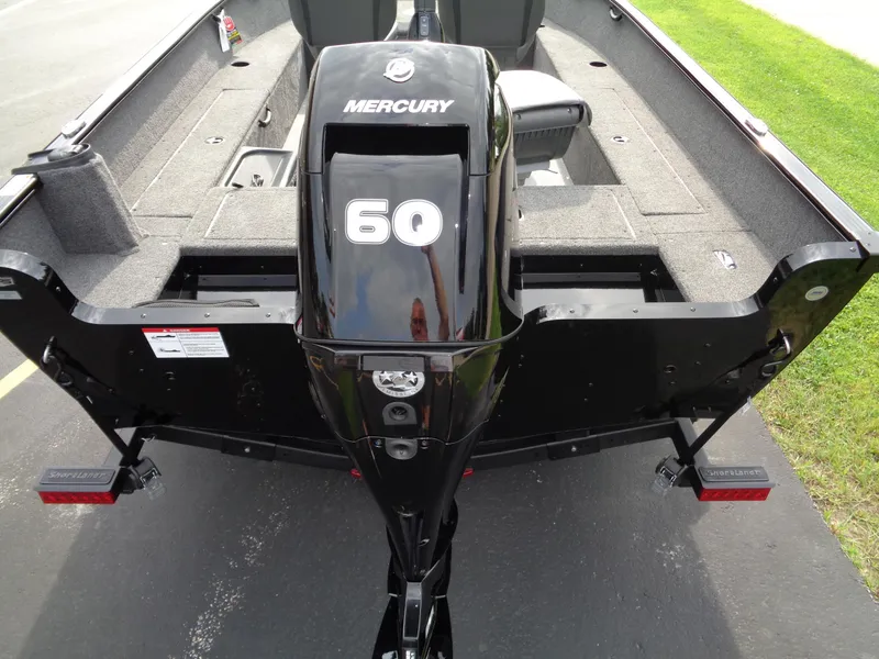 Slide: The Image of 2025 Lund 1650 Rebel XL Tiller with Mercury 60 engine, rear view. - 7