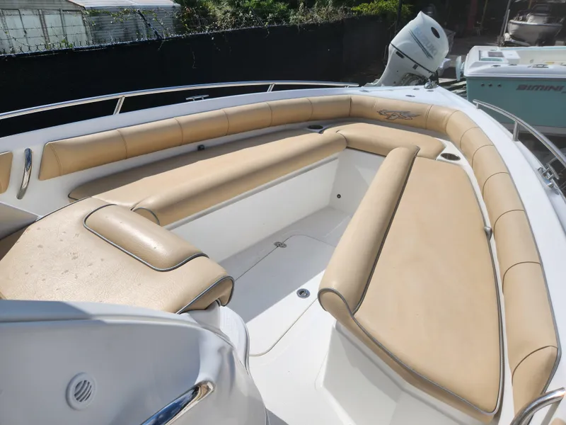Slide: The Image of 2018 Glasstream 255 Pro-XS boat with tan seating and spacious deck. - 10