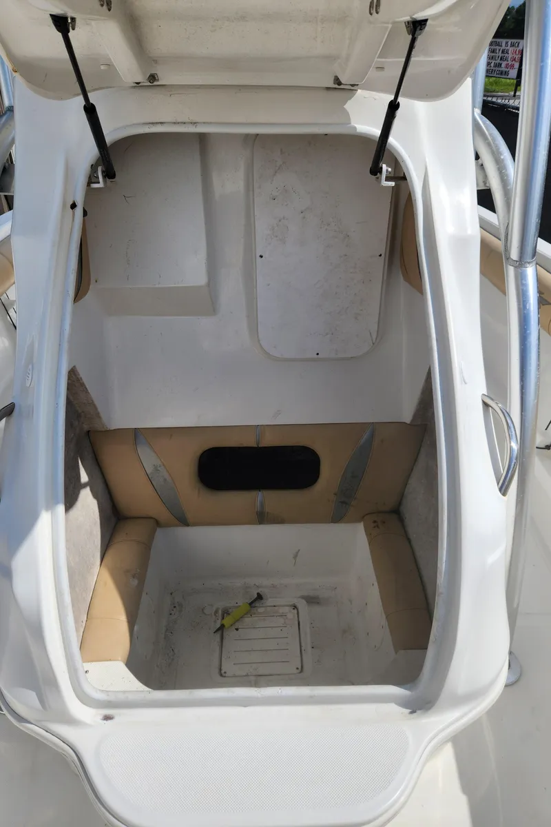 Slide: The Image of 2018 Glasstream 255 Pro-XS boat interior storage compartment. - 12