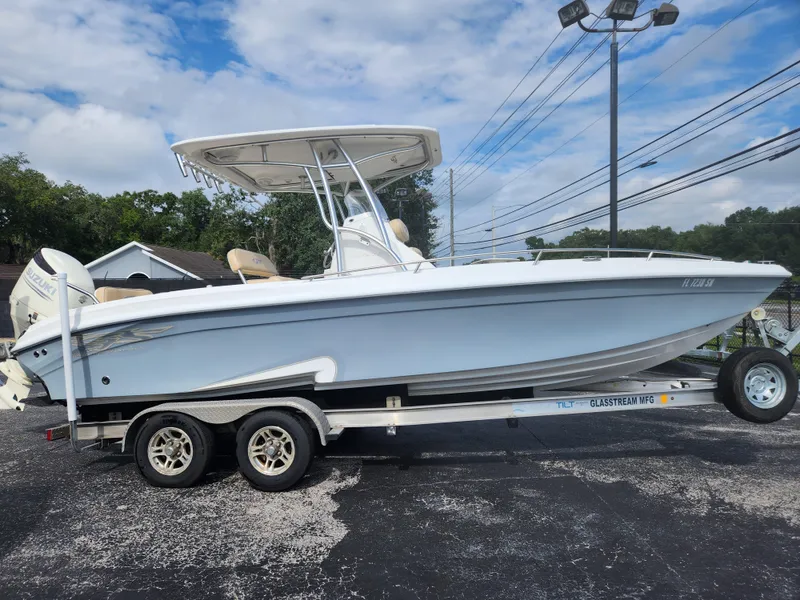 Slide: The Image of 2018 Glasstream 255 Pro-XS boat on trailer, parked outdoors. - 15