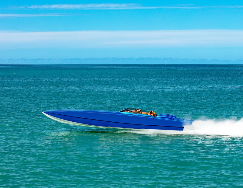 Slide: The Image of Blue Skater 46 speedboat cruising on open water, 2013 model. - 9