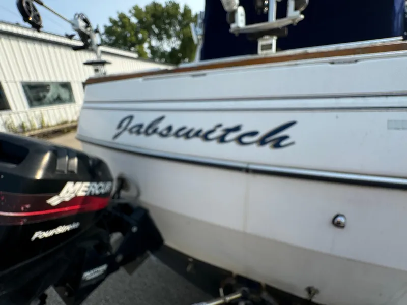 Slide: The Image of 1996 Bayliner 2452 Ciera Express Hardtop with Mercury outboard motor. - 2