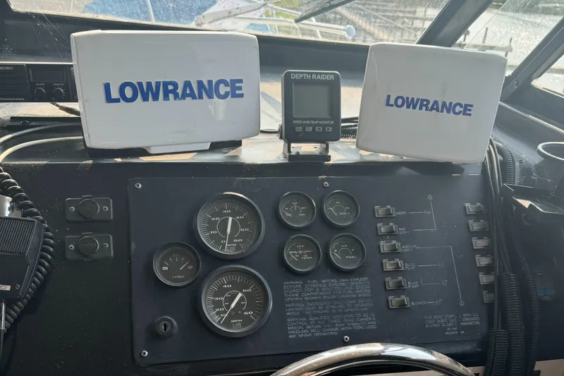 Slide: The Image of Dashboard of a 1996 Bayliner 2452 Ciera Express with Lowrance navigation equipment. - 6