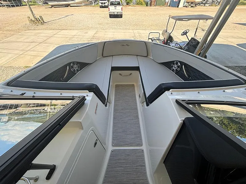Slide: The Image of 2025 Sea Ray SPX 210 boat interior with spacious seating and modern design. - 10