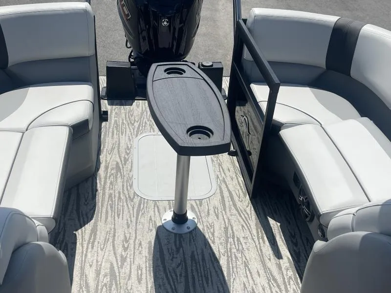 Slide: The Image of 2025 G3 SunCatcher V322 RC boat interior with seating and table. - 10