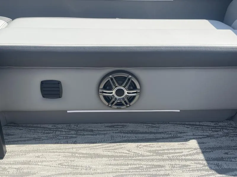 Slide: The Image of 2025 G3 SunCatcher V322 RC boat interior with speaker and seating detail. - 7