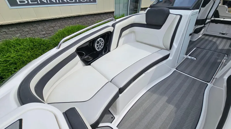 Slide: The Image of 2019 Yamaha Boats 242 LIMITED S E SERIES interior with sleek seating and modern design. - 19