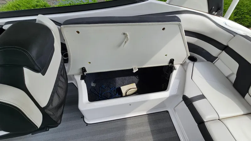 Slide: The Image of 2019 Yamaha Boats 242 LIMITED S E SERIES interior storage compartment open. - 27