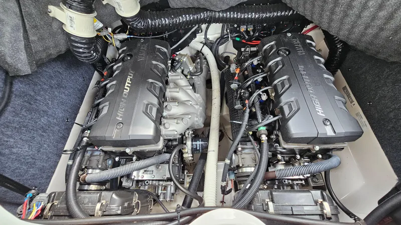 Slide: The Image of 2019 Yamaha Boats 242 LIMITED S E SERIES engine compartment with dual engines. - 30
