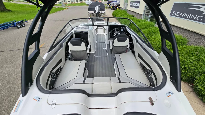 Slide: The Image of 2019 Yamaha Boats 242 LIMITED S E SERIES interior with sleek seating and modern design. - 6