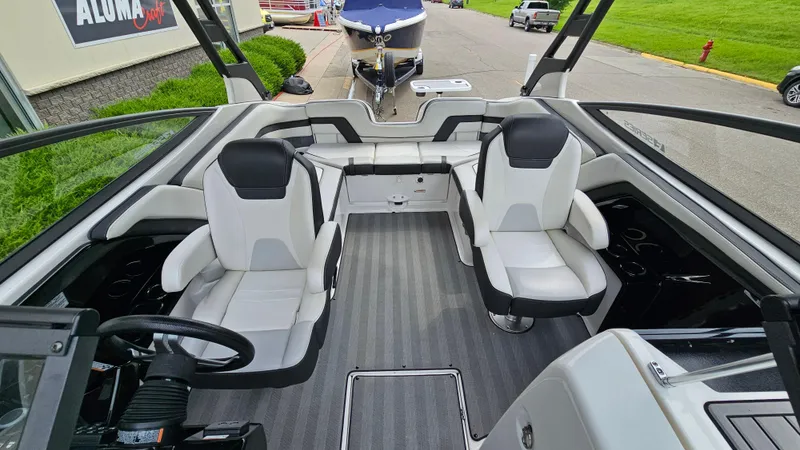 Slide: The Image of 2019 Yamaha Boats 242 LIMITED S E SERIES interior with sleek seating and modern design. - 7