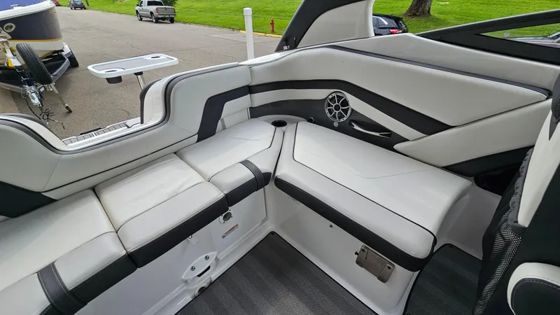 Slide: The Image of 2019 Yamaha Boats 242 LIMITED S E SERIES interior with sleek seating and modern design. - 9