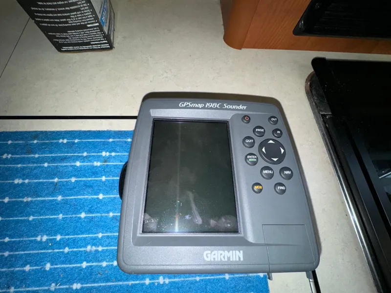 Slide: The Image of Garmin GPSmap 198C Sounder on Bayliner 288 Classic 2005 boat interior. - 14