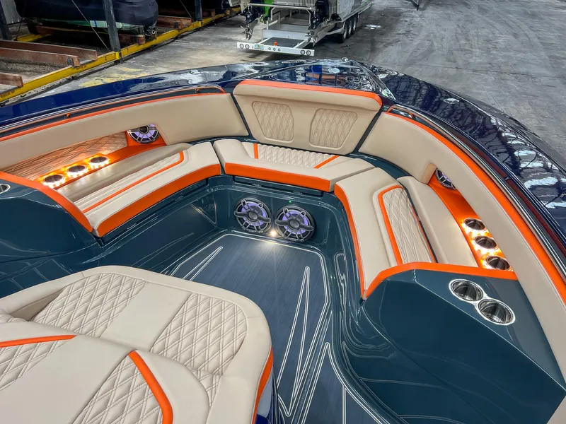 Slide: The Image of Luxurious interior of 2024 MTI V42 boat with elegant seating and ambient lighting. - 20