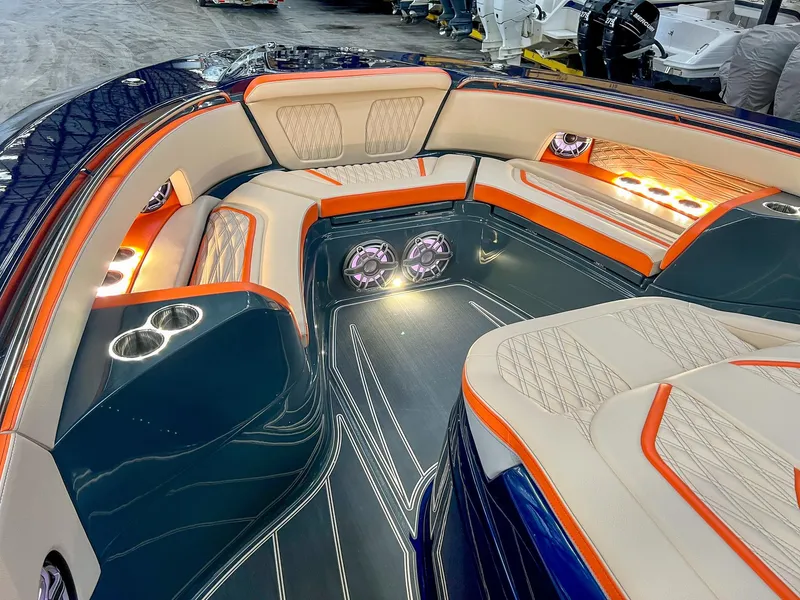Slide: The Image of Luxurious 2024 MTI V42 boat interior with elegant seating and ambient lighting. - 4
