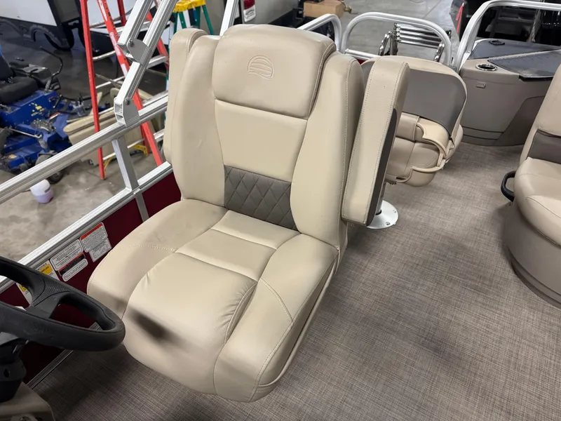 Slide: The Image of 2025 Sun Tracker Bass Buggy 18 DLX boat seat, beige upholstery, interior view. - 5