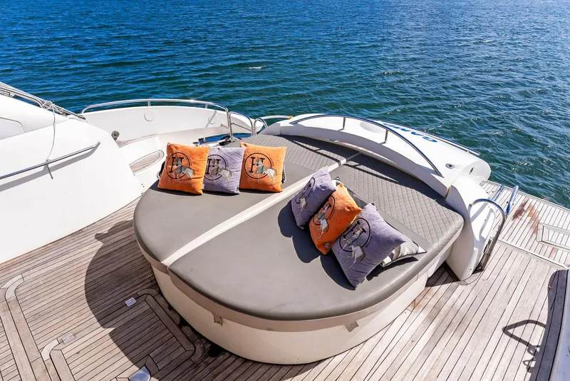 Slide: The Image of Sunseeker Predator 75 yacht deck with cushions, 2001 model, on open water. - 10