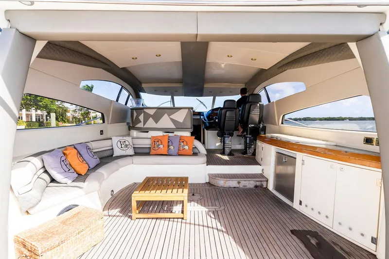 Slide: The Image of Luxurious interior of 2001 Sunseeker Predator 75 yacht with modern seating and sleek design. - 12