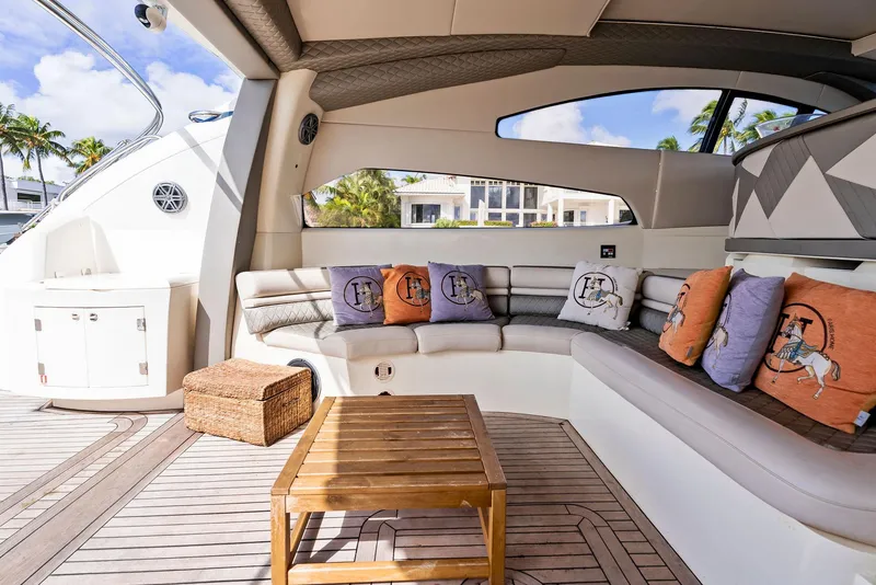 Slide: The Image of Luxurious 2001 Sunseeker Predator 75 yacht interior with plush seating and decorative cushions. - 13