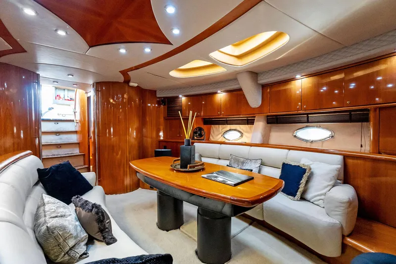 Slide: The Image of Luxurious interior of 2001 Sunseeker Predator 75 yacht with elegant wood finishes. - 25