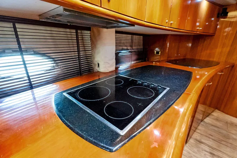Slide: The Image of Luxurious kitchen interior of 2001 Sunseeker Predator 75 yacht with sleek countertops. - 32