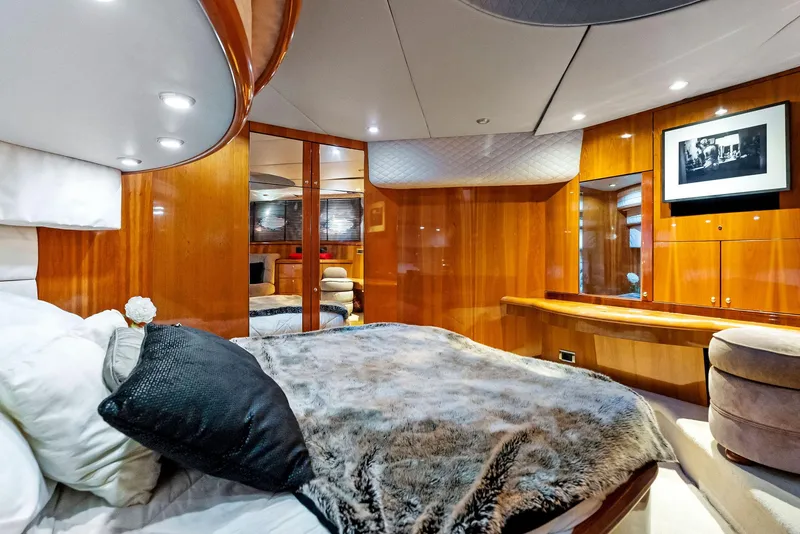 Slide: The Image of Luxurious cabin interior of 2001 Sunseeker Predator 75 yacht with elegant wood finishes. - 46