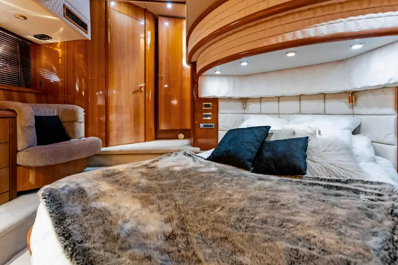 Slide: The Image of Luxurious bedroom interior of 2001 Sunseeker Predator 75 yacht with plush bedding. - 47