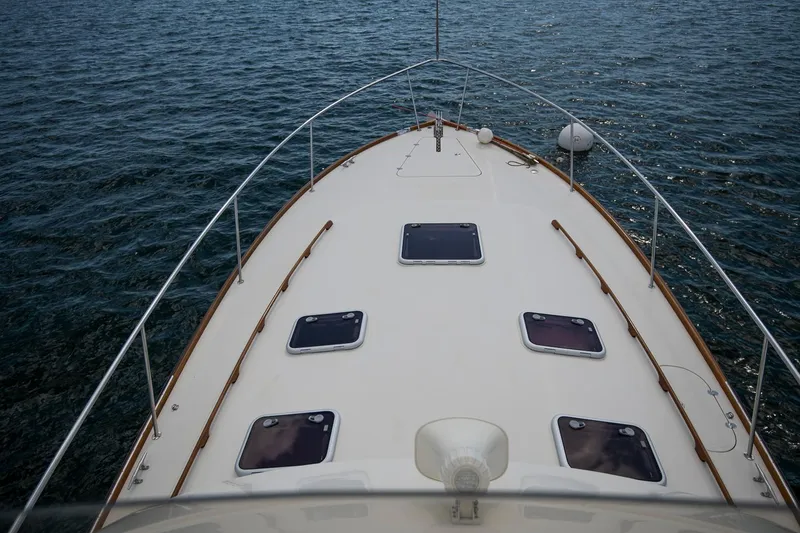 Slide: The Image of Hinckley Talaria 44 FB 2006 yacht deck view on calm water. - 21