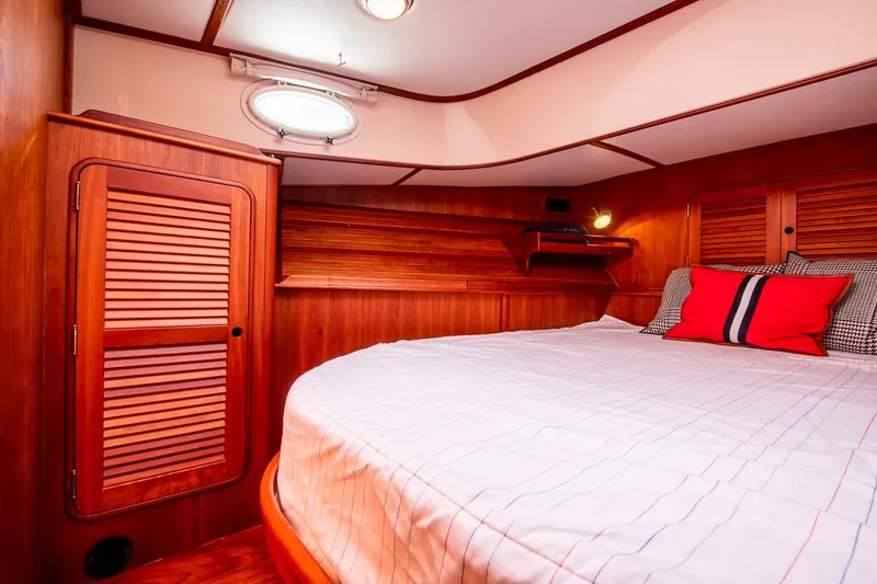 Slide: The Image of Luxurious cabin interior of 2006 Hinckley Talaria 44 FB yacht with wooden finish. - 41
