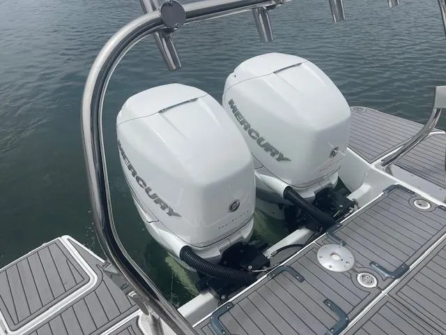 Slide: The Image of Twin Mercury outboard engines on 2022 Beneteau 32 Gran Turismo boat. - 26