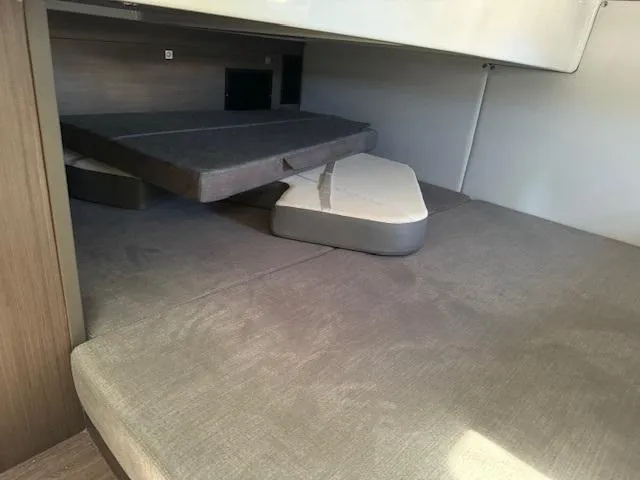 Slide: The Image of Interior cabin of 2022 Beneteau 32 Gran Turismo with convertible seating. - 7