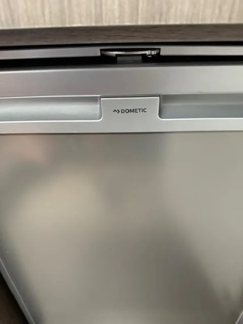 Slide: The Image of Dometic appliance in 2022 Beneteau 32 Gran Turismo yacht interior. - 9