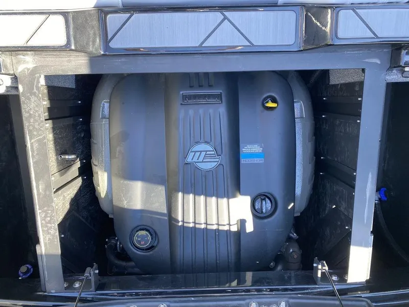 Slide: The Image of 2025 Malibu 23 LSV engine compartment showcasing powerful inboard motor. - 17