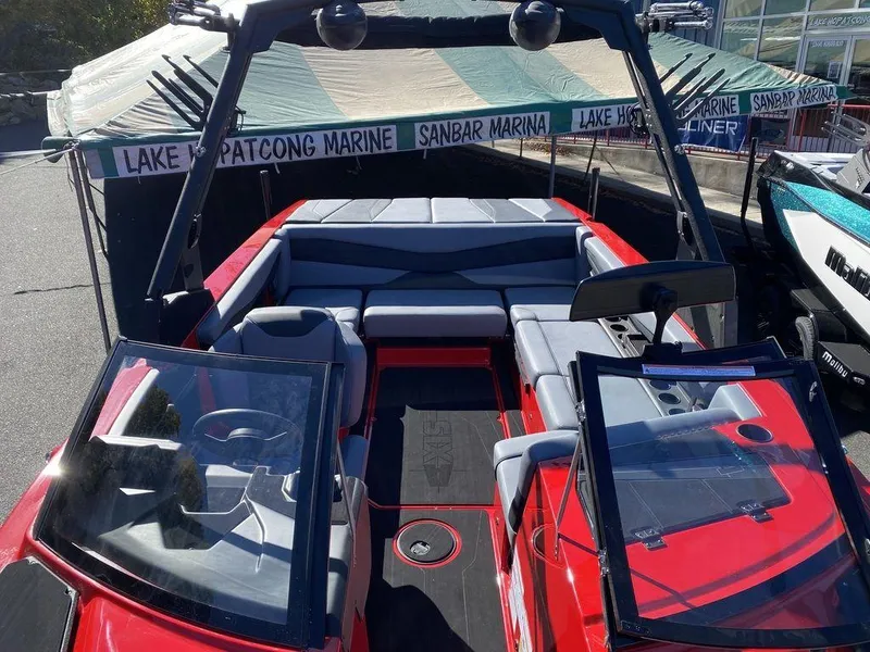 Slide: The Image of Red 2025 Axis A225 boat with open seating, displayed at Lake Hopatcong Marine. - 13