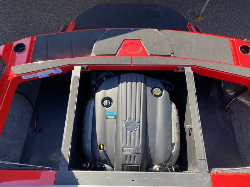 Slide: The Image of 2025 Axis A225 boat engine compartment with a powerful inboard motor. - 15