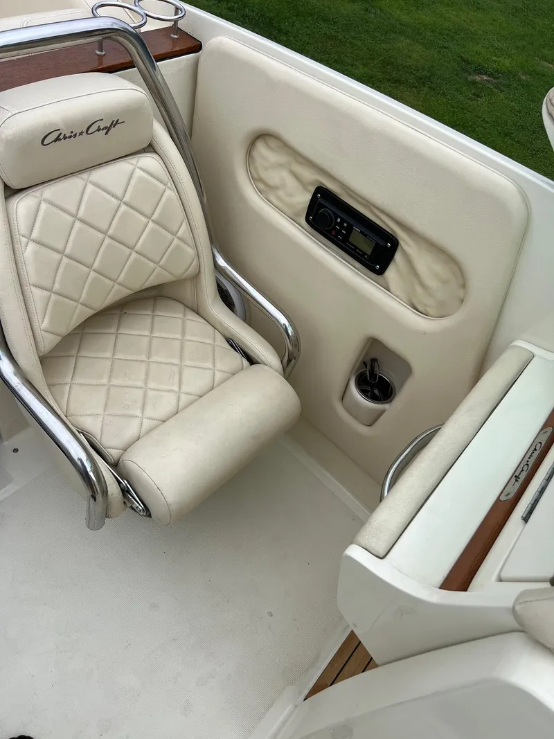 Slide: The Image of Luxurious interior of 2014 Chris-Craft 32 Launch boat with quilted seating. - 6