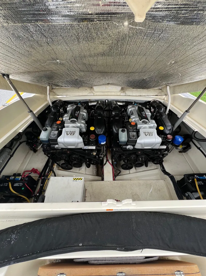 Slide: The Image of 2014 Chris-Craft 32 Launch engine compartment with dual V8 engines. - 7