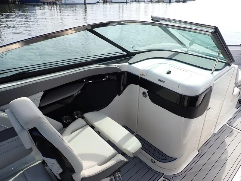 Slide: The Image of 2024 Sea Ray SLX 260 Outboard boat interior with sleek seating and modern design. - 17