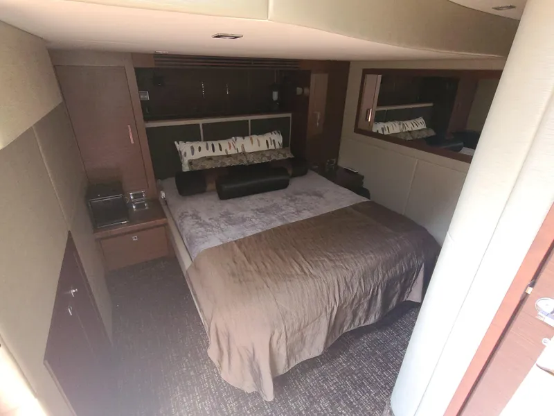 Slide: The Image of Luxurious bedroom interior of 2014 Sea Ray 510 Sundancer yacht with elegant bedding. - 12