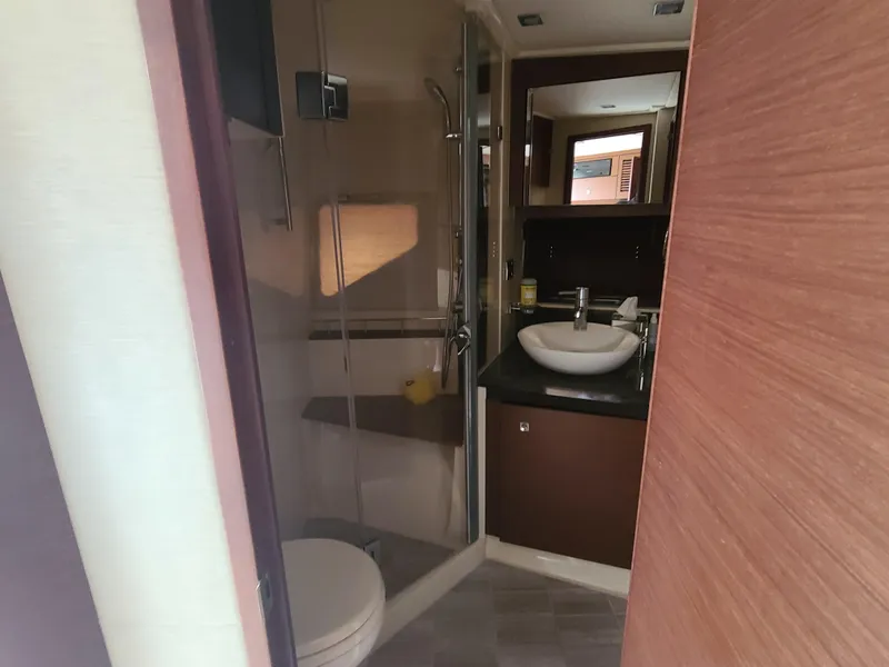 Slide: The Image of Luxurious bathroom in 2014 Sea Ray 510 Sundancer yacht with modern fixtures. - 13