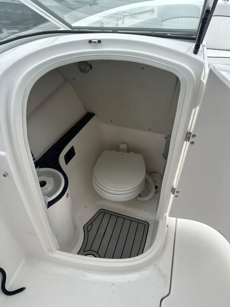 Slide: The Image of 2020 Sea Fox 226 Traveler boat interior with compact marine toilet. - 10