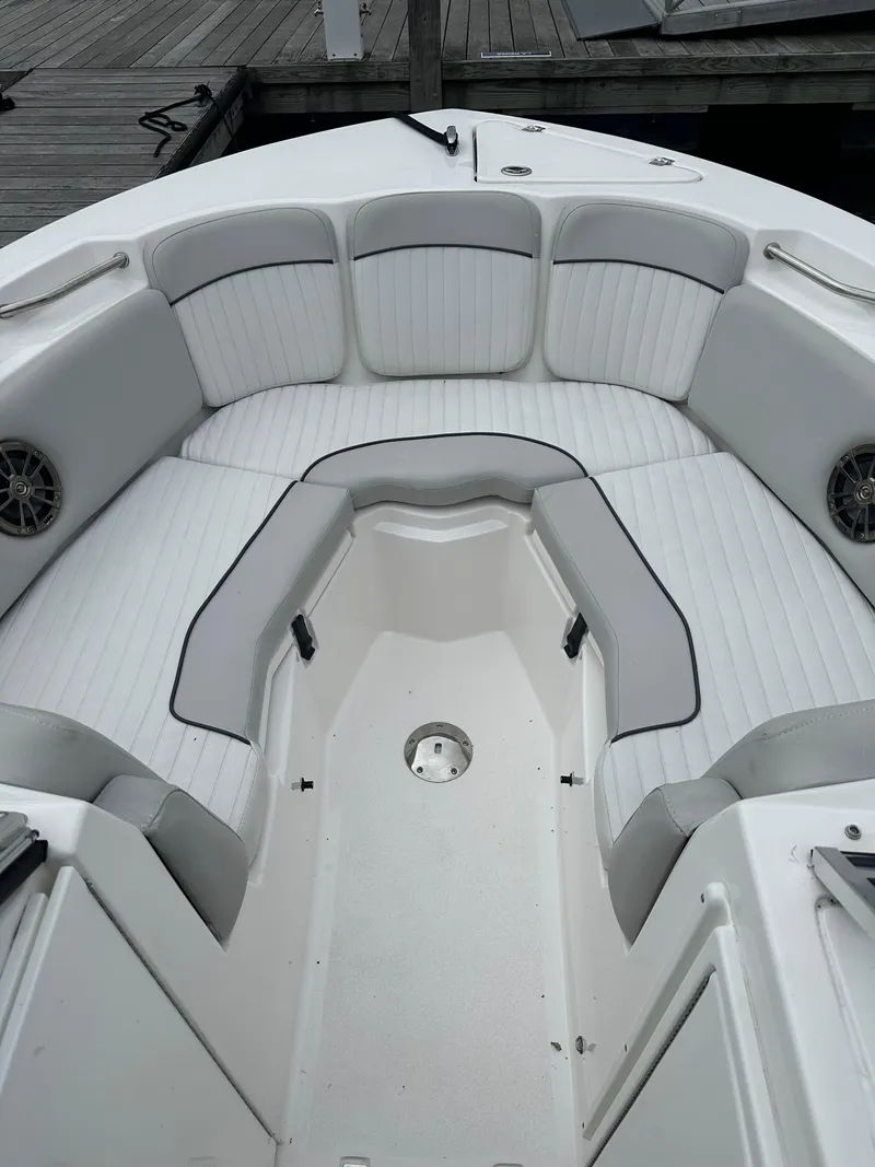 Slide: The Image of 2020 Sea Fox 226 Traveler boat interior with cushioned seating and speakers. - 11