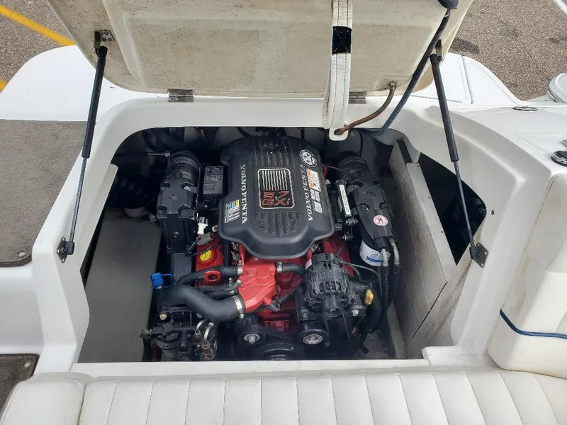 Slide: The Image of Open engine compartment of a 2007 Cobalt 240 boat, showcasing the engine details. - 8