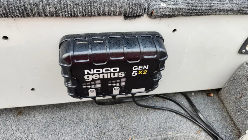 Slide: The Image of NOCO Genius GEN 5X2 charger installed on 1995 MirroCraft GUIDE IMPACT 16 V boat. - 12