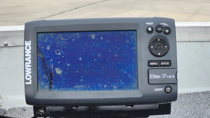 Slide: The Image of Lowrance Elite-7 HDI fish finder on 1995 MirroCraft GUIDE IMPACT 16 V boat. - 8
