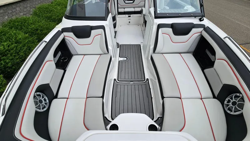 Slide: The Image of 2018 Yamaha Boats 212 X interior with sleek seating and modern design. - 15