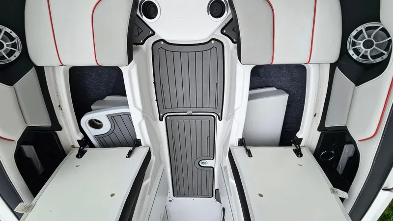 Slide: The Image of 2018 Yamaha Boats 212 X interior with sleek seating and modern design. - 19