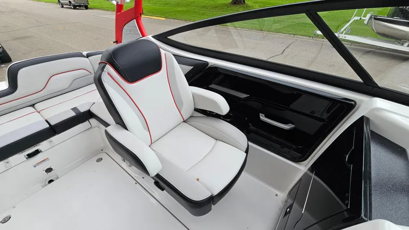 Slide: The Image of 2018 Yamaha Boats 212 X interior with sleek seating and modern design. - 8