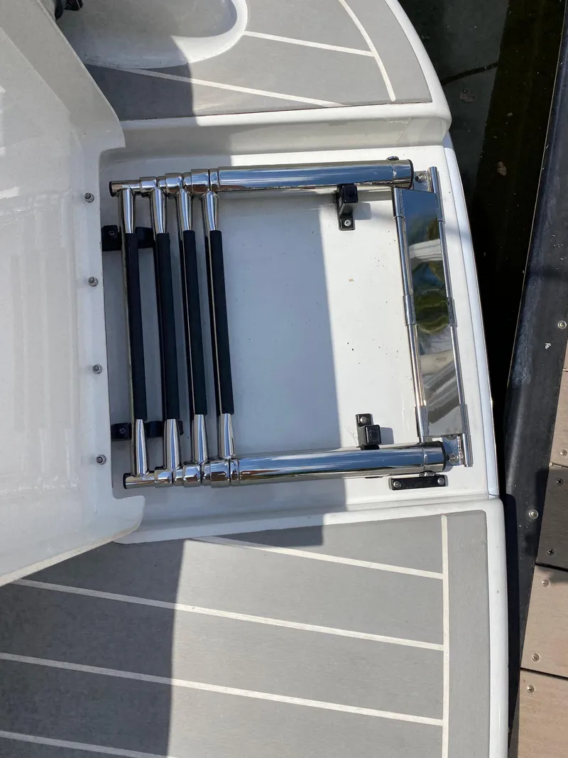 Slide: The Image of 2021 Formula 310 Bowrider I/O swim platform with retractable ladder. - 11