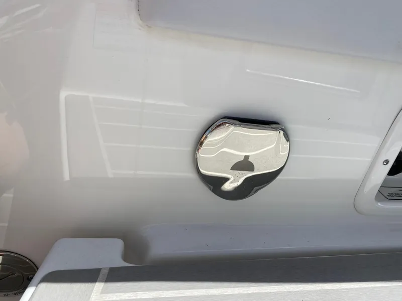 Slide: The Image of 2021 Formula 310 Bowrider I/O, sleek exterior detail with chrome accent. - 14